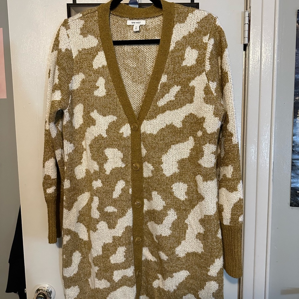 Caramel and White spotted long button up cardigan.